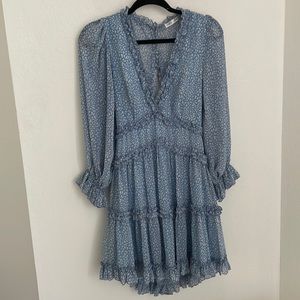 “The dress!” Blue printed long sleeve ruffle dress